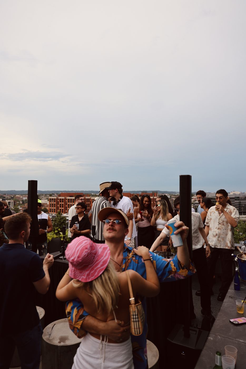 Versus crowd on the rooftop at a Welcome Week event